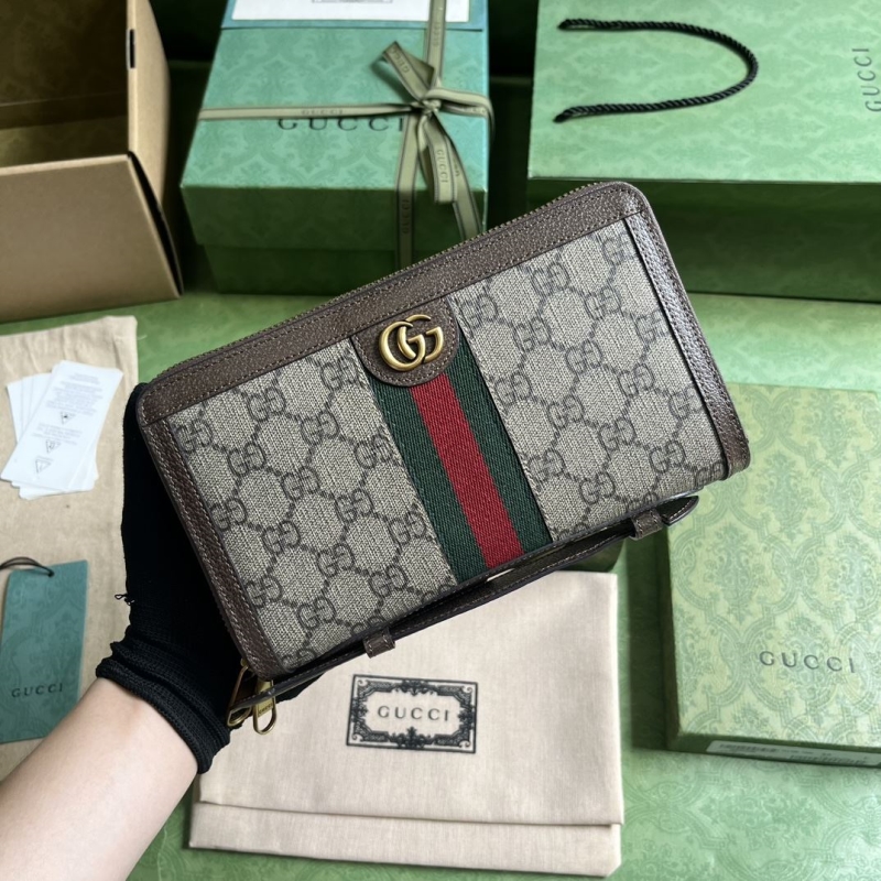 G*u*i clutch bags